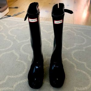 Knew high Hunter rain boots. Size 9. Color: Black